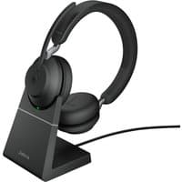 Black Jabra Evolve2 65 USB-C stereo headset on charging stand with padded ear cups and adjustable headband.