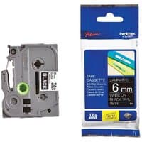 Brother P-Touch TZE315 6mm tape cassette, white text on black, gray plastic casing, packaged in blue and white box.