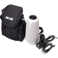 Black Owl Labs soft-sided carrying case with a gray cylindrical Meeting Owl camera and black power cables.