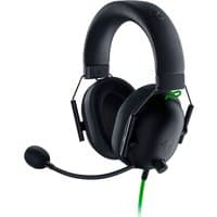 Black Razer Blackshark V2 X gaming headset with green accents, wired, over-ear design, and adjustable headband.