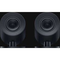 Black Razer Nommo V2 X speakers with cylindrical design and front-facing drivers, wired and wireless options.