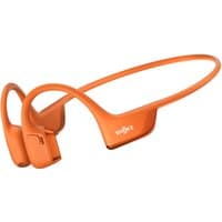 Orange Shokz Openrun Pro 2 bone-conducting headphones with wraparound band and ear hooks.