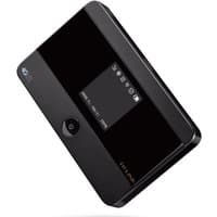 Black TP-Link 4G LTE Mobile Wi-Fi device with small screen displaying signal strength and battery icons.