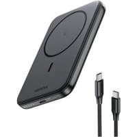 Black Ugreen 25207 power bank 5000 mAh with wireless charging, circular charging pad, and USB-C cable.