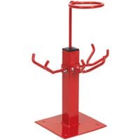 Red Sealey spray gun holder with three hooks and filter ring on a square base.