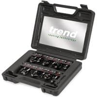 Black Trend router cutter set in a hard case with 12 pieces neatly arranged in foam slots.