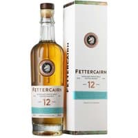 Fettercairn 12 Year Whisky 70cl in clear bottle with brown cap, label with logo, next to matching white box.