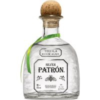 Patrón Silver Tequila 70cl bottle with cork stopper, green ribbon, and clear glass showing silver tequila inside.