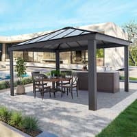 Grey Palram Canopia gazebo, 14' x 14', with a sloped roof and sturdy square posts, set in a modern garden.