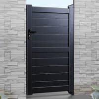 Black Exeter Premium Metal Side Gate with horizontal slats and sleek modern design, framed by stone walls.