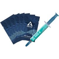 Green Arctic MX-6 thermal paste syringe with blue cap, accompanied by multiple blue MX Cleaner packets.