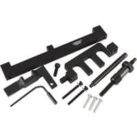 Black Draper Expert Engine Timing Kit ETK125 for BMW, includes various metal tools and bolts for engine maintenance.