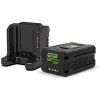 Greenworks 60V 4Ah battery and black charger kit with green logo and LED indicators.