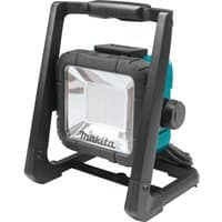 Makita DML805/2 cordless worklight with black frame, turquoise body, and LED panel, featuring a sturdy handle.