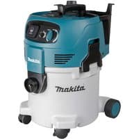 Makita VC3012M M Class Dust Extractor, teal and white body, black handle, wheels, and control panel on top.