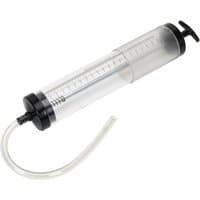 Clear Sealey oil suction syringe 550ml with black plunger, measurement markings, and flexible white hose.