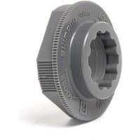 Gray Shimano SPD Axle Removal Tool with ridged grip and hexagonal shape, featuring internal grooves for axle fitting.