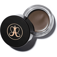 Black jar of Anastasia Beverly Hills Dipbrow Pomade-Caramel with gold logo, open to show smooth caramel-brown pomade.