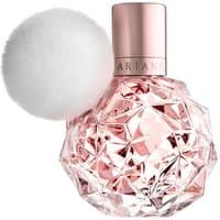 Pink faceted perfume bottle with rose gold cap and white pom-pom, Ariana Grande Ari Eau de Parfum Spray 50 ml.