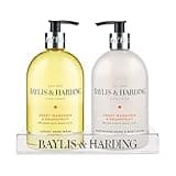 Baylis & Harding hand wash and lotion set with pump dispensers, clear and white bottles, on a branded tray.