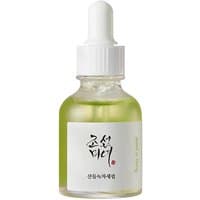 Clear glass dropper bottle with green serum, white cap, and Korean text label, Beauty of Joseon Calming Serum.