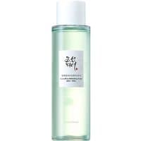 Clear cylindrical bottle with white cap, green liquid inside, labeled "Beauty of Joseon Green Plum Refreshing Toner AHA + BHA."