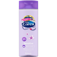 Carex Bath Foam Shampoo Sensitive 500ml, purple bottle with flip cap, floral design, and sensitive skin label.