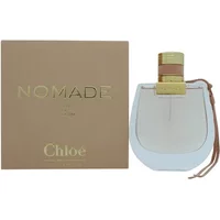 Chloé Nomade Eau De Parfum 75ml with a curved glass bottle, gold cap, and tan leather strap beside a tan box.