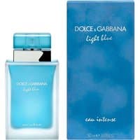 Blue frosted glass perfume bottle with silver cap, next to matching blue box labeled "Dolce & Gabbana Light Blue Intense."