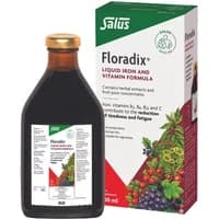 Brown glass bottle with gold cap, labeled "Floradix Liquid Iron Formula 500ml," next to a colorful box.