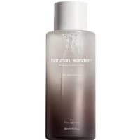 Clear cylindrical bottle of Haruharu Wonder Black Rice Hyaluronic Toner with white cap and minimalist design.