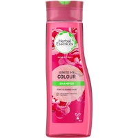 Pink Herbal Essences Ignite My Colour Shampoo bottle, 400ml, with floral design and green cap.