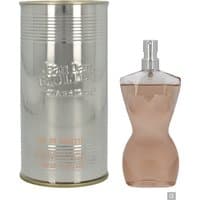 Curvy, torso-shaped pink glass bottle of Jean Paul Gaultier Classique Eau de Toilette with silver cylindrical tin.