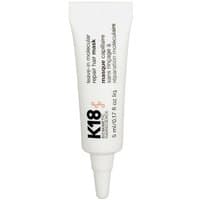 White tube of K18 Leave-In Molecular Repair Hair Mask, 5ml, with black and red text, pointed applicator tip.