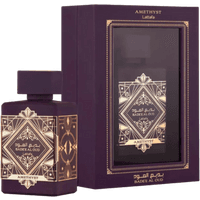 Lattafa Bade'e Al Oud Amethyst EDP, 100ml, dark purple bottle with ornate gold design, matching box with clear window.