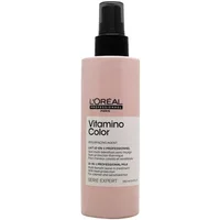 Pink spray bottle of L'Oréal Professionnel Serie Expert Vitamino Colour with black cap and white label.