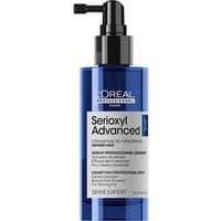 Blue L'Oréal Professionnel Serioxyl Advanced Denser Hair Serum bottle with black pump and white label.