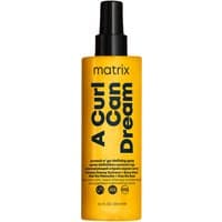 Yellow Matrix A Curl Can Dream Defining Spray bottle with black text and cap, 150ml.