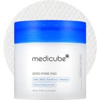 White jar with blue lid labeled "medicube Zero Pore Pad 2.0," featuring textured round pads in the background.