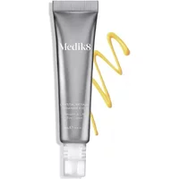 Silver Medik8 Crystal Retinal Ceramide Eye 6 tube with white cap and yellow cream swirl.