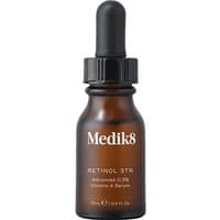 Brown glass bottle of Medik8 Intelligent Retinol 3TR with black dropper cap, 15ml size, white text label.