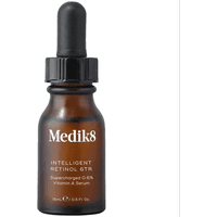 Brown glass bottle with black dropper cap, labeled "Medik8 Intelligent Retinol 6TR 15ml" in white text.