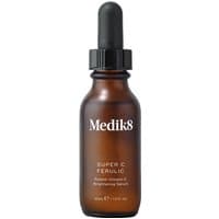 Brown glass bottle with dropper, labeled "Medik8 Super C Ferulic," featuring white text and black cap, 30ml size.