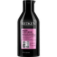 Black Redken Acidic Color Gloss Shampoo bottle, 500ml, with pink label and pH 5.0-6.5 details.