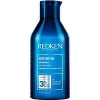 Blue Redken Extreme Shampoo bottle, 300ml, with white text and black cap, designed for damaged hair repair.