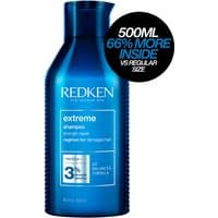 Blue Redken Extreme Shampoo bottle, 500ml, with white text and black cap, labeled "66% more inside."