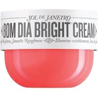 Red jar of Sol De Janeiro Bom Dia Bright Body Cream with white lid and bold black text.