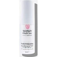 White Spotlight Oral Care Whitening Accelerator Gel bottle, 30ml, with red logo and black text on the label.