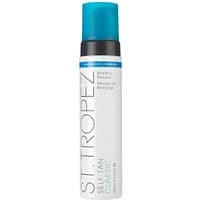 White St.Tropez Self Tan Classic Bronzing Mousse bottle, blue cap, black pump, 240ml label.