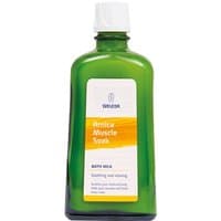 Green bottle of Weleda Arnica Muscle Soak 200ml with white cap and label featuring orange and white text.